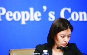 揭秘两会冷艳美女翻译:初中时就是位风云人物-中国煤炭(煤矿)新闻网